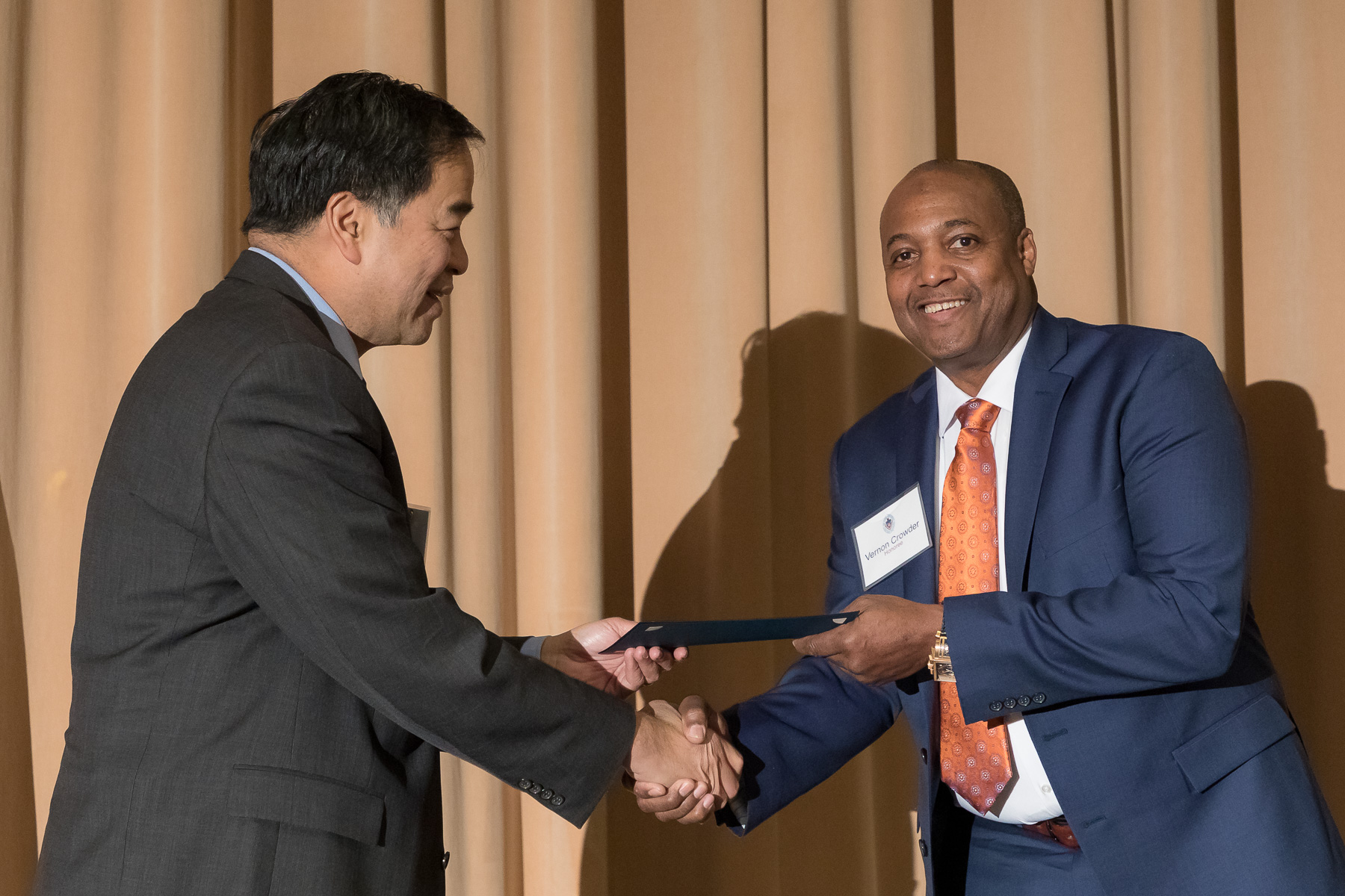 Vernon Crowder, right, with A. Gabriel Esteban, Ph.D., president, as faculty and staff members are inducted into DePaul University's 25 Year Club, Tuesday, Nov. 13, 2018, at the Lincoln Park Student Center. Employees celebrating their 25th work anniversary were honored at the luncheon with their colleagues and will have their names added to plaques located on the Loop and Lincoln Park Campuses. (DePaul University/Jeff Carrion)